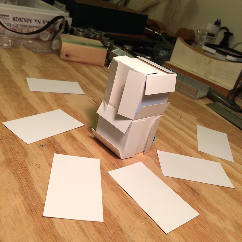 Two interlocking business card cubes